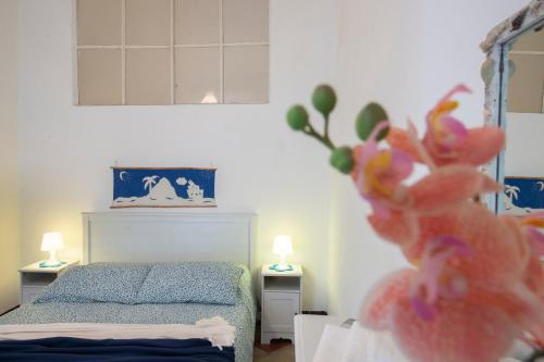 Postel nebo postele na pokoji v ubytování Casa In Piazza
