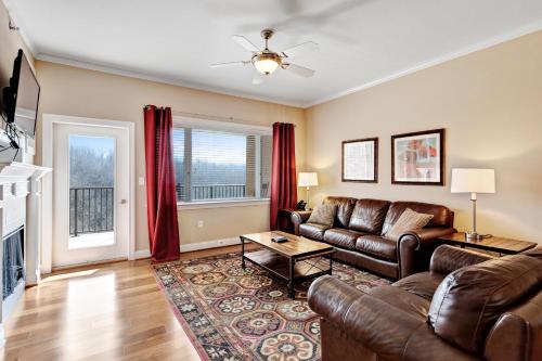 a living room filled with furniture and a fireplace at Venus Lodges Condos in Gatlinburg