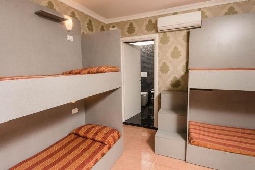 เตียงในห้องที่ Hostel Beautiful