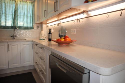 Kuchyňa alebo kuchynka v ubytovaní Coronado 147 Casasol Apartments