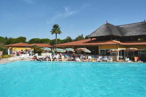 Πισίνα στο ή κοντά στο Happy Camp mobile homes in Camping Free Beach