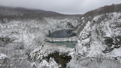 an aerial view of a mountain covered in snow at Apartment Goran in Poljanak