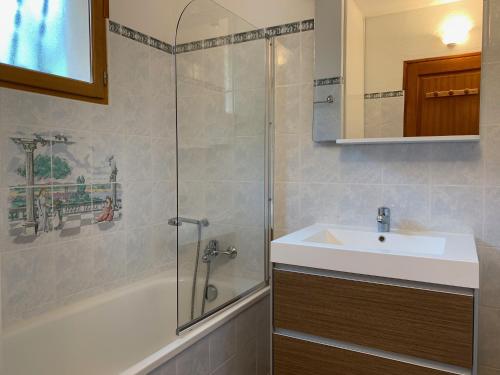 Ванная комната в Résidence & SPA Marina d'Arone