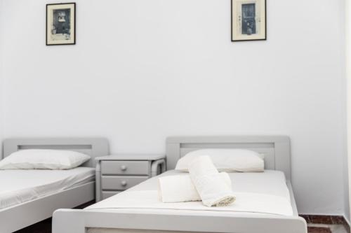 Postel nebo postele na pokoji v ubytování gatis place