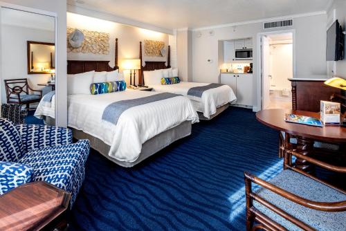 Ένα ή περισσότερα κρεβάτια σε δωμάτιο στο TradeWinds Island Grand