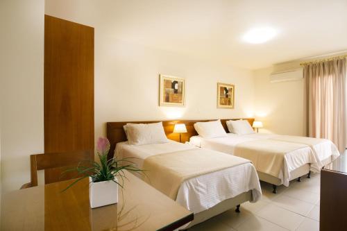 Postel nebo postele na pokoji v ubytování Hotel ΑΤΗΙΝΑ