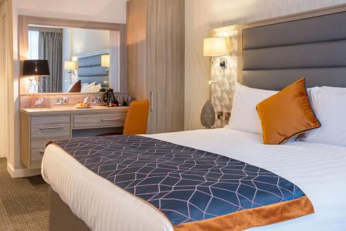 Un ou plusieurs lits dans un hébergement de l'établissement Metro Hotel Dublin Airport