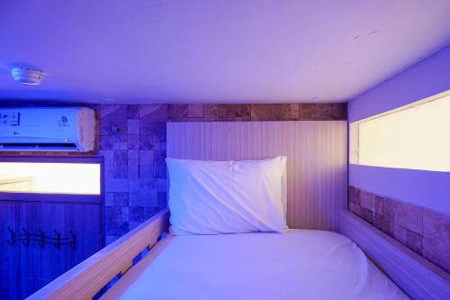 Кровать или кровати в номере Comfortable 3BR Apartment at Green Palm Residences By Travelio
