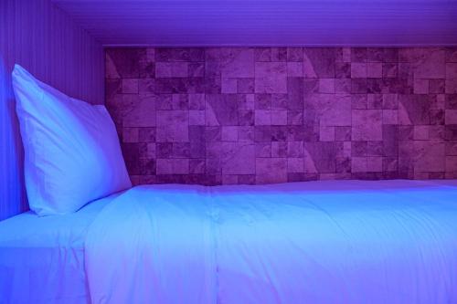 Кровать или кровати в номере Comfortable 3BR Apartment at Green Palm Residences By Travelio