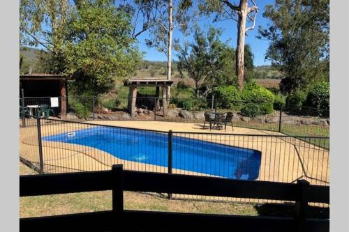 a fence around a swimming pool in a yard at SAREAL PARK in Kerry