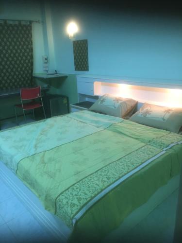 Postel nebo postele na pokoji v ubytování Baan Suan Resort2345