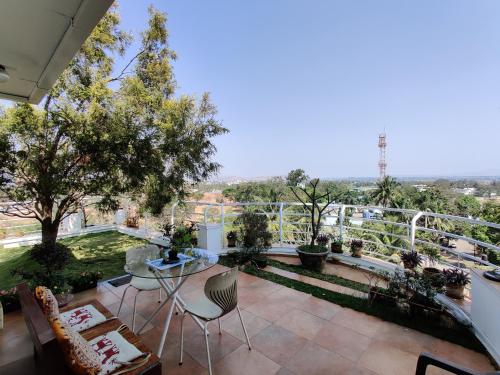 a balcony with a view of a city at Garden Homes 1& 6 in Kolhapur