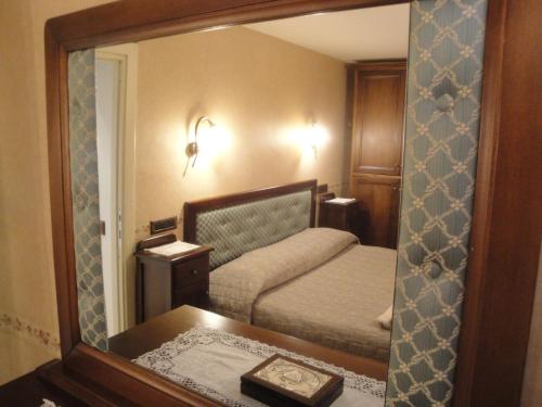 Giường trong phòng chung tại Casa Mary