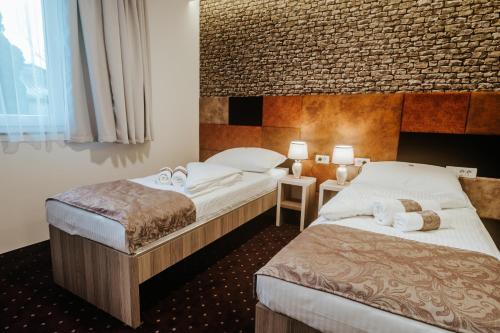 Ένα ή περισσότερα κρεβάτια σε δωμάτιο στο Hotel & Spa Meydan