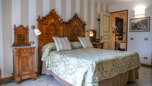 Postel nebo postele na pokoji v ubytování Hotel Du Lac