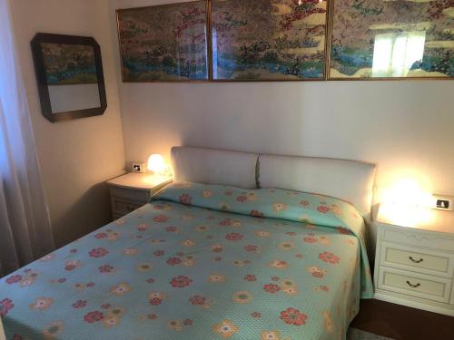 Giường trong phòng chung tại Nicole 1