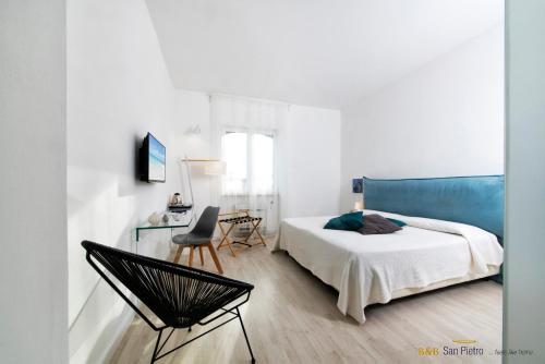 Ένα ή περισσότερα κρεβάτια σε δωμάτιο στο B&B San Pietro