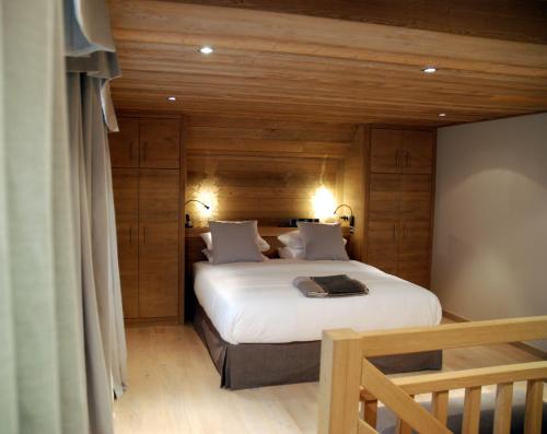 Katil atau katil-katil dalam bilik di Le Grand Chalet et Spa