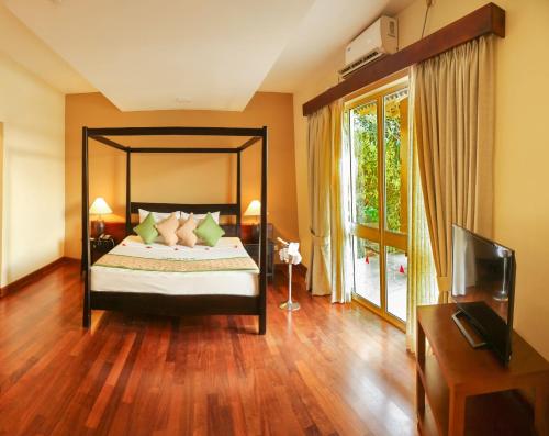 Postel nebo postele na pokoji v ubytování Club Palm Bay