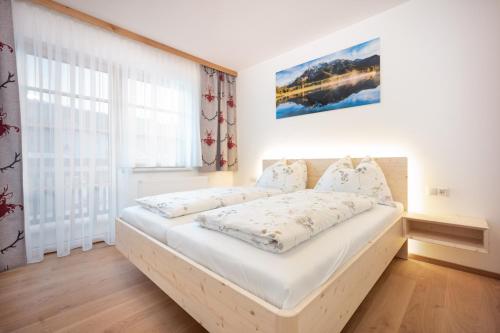 Posteľ alebo postele v izbe v ubytovaní Haus Alpenruhe by Schladmingurlaub