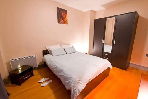 Ένα ή περισσότερα κρεβάτια σε δωμάτιο στο Aix-les-bains - Le Splendide - Riviera des Alpes