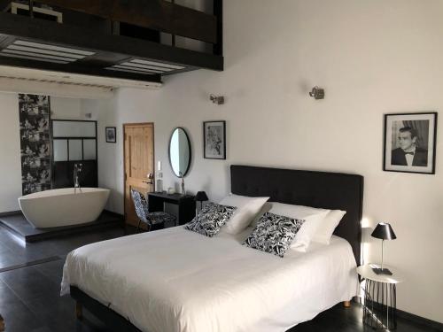 Postel nebo postele na pokoji v ubytování B&B dans Mas en pierres
