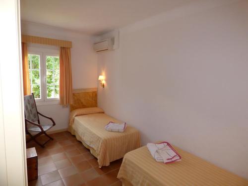 villa romana Bonaire房間的床