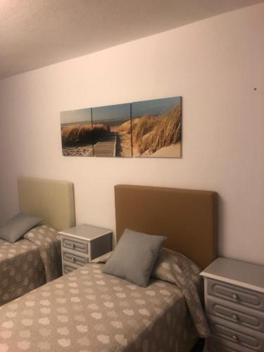 Postel nebo postele na pokoji v ubytování Debimar Apartamentos