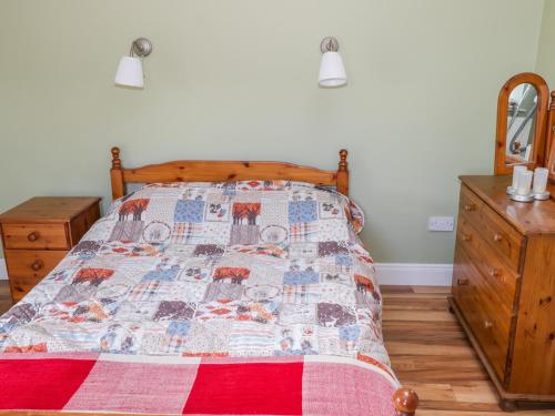 Ένα ή περισσότερα κρεβάτια σε δωμάτιο στο Joe's Cottage