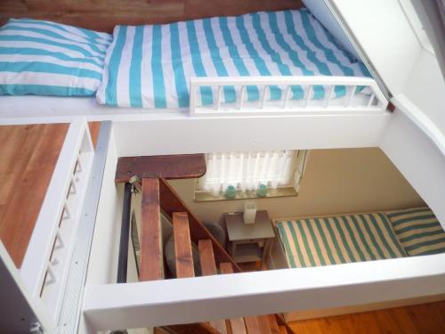 Ένα ή περισσότερα κρεβάτια σε δωμάτιο στο Ferienhaus Heideblüte