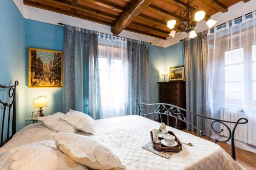 Postel nebo postele na pokoji v ubytování Casa Di Meo