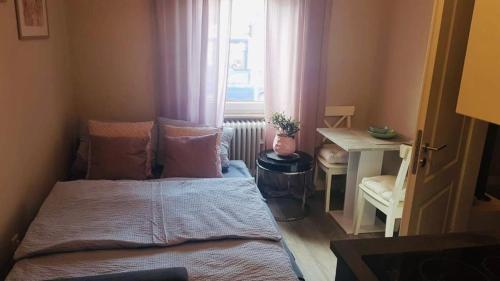 Ένα ή περισσότερα κρεβάτια σε δωμάτιο στο Villa Rosa Bad Camberg