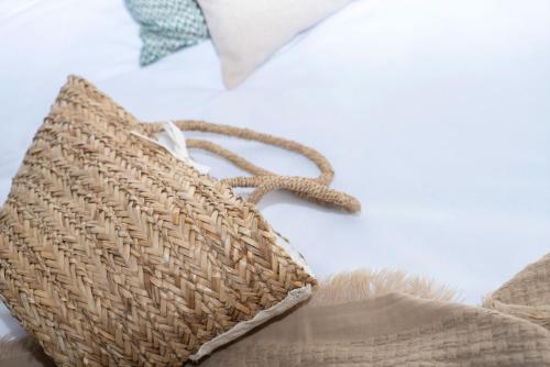 a wicker basket sitting on top of a table at Niss Lara Hotel in Antalya