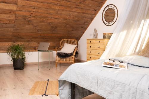 Posteľ alebo postele v izbe v ubytovaní Pod Mazurskim Niebem boho