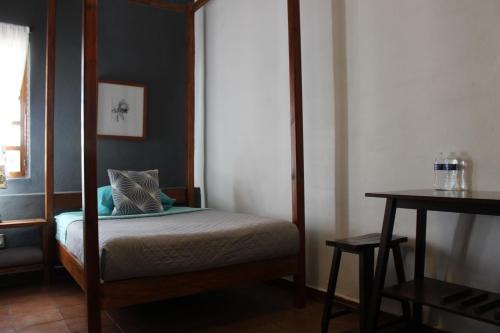 Ένα ή περισσότερα κρεβάτια σε δωμάτιο στο Hotel Real de Piedra