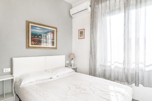 Postel nebo postele na pokoji v ubytování Lia Rooms 2