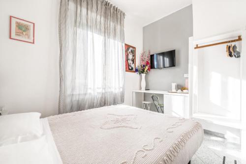 Postel nebo postele na pokoji v ubytování Lia Rooms 2