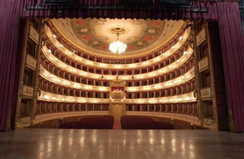 a view of an auditorium of a theatre at La casa del Centro in Modena