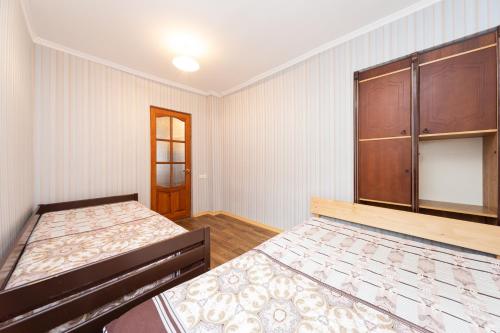Postel nebo postele na pokoji v ubytování Dom v Arkadii