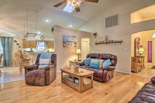 a living room with a couch and chairs and a table at 2 Mi to Golf Retreat with Hot Tub in Ocean Pines in Ocean Pines