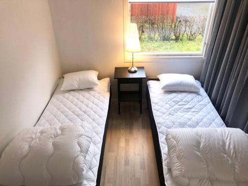 Säng eller sängar i ett rum på Great apartment near nature and Isaberg