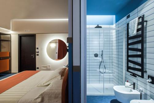 Vannas istaba naktsmītnē Hotel Dimora Del Monaco