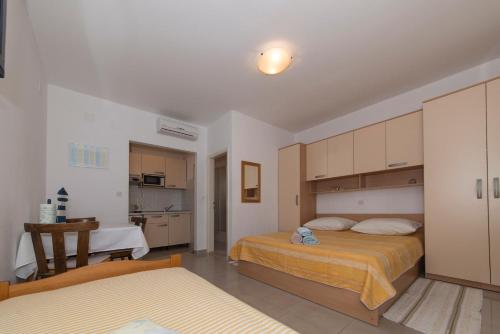 Cama o camas de una habitación en Apartment Villa Bešker