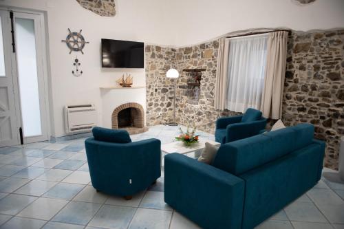 Ruang duduk di Cilento Apartment