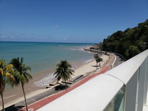 a view of the beach from the top of a building at Flet Beira-mar, Blue Sucet in João Pessoa
