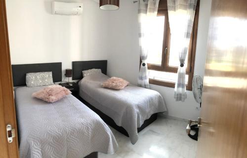 Postel nebo postele na pokoji v ubytování Casa de Nio