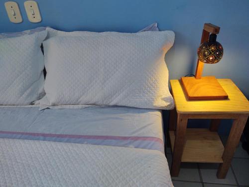 
Cama o camas de una habitación en Pontal dos Sonhos - Suites Enseada Beira Mar
