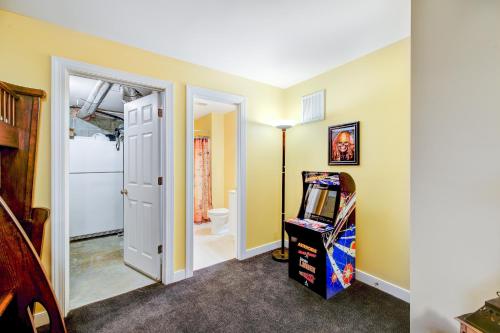 a room with a door and a video game at Sunset Cove in Bumpass