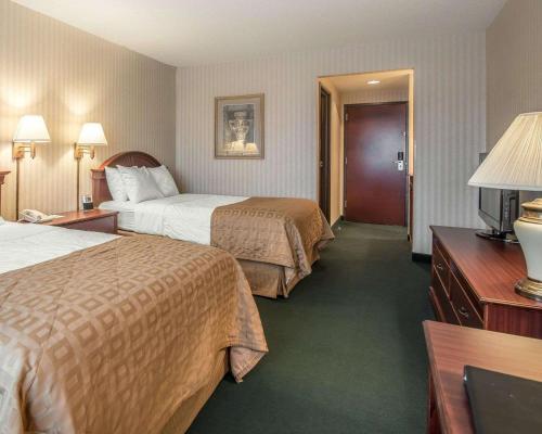Кровать или кровати в номере The Marx Hotel - Downtown - University Area