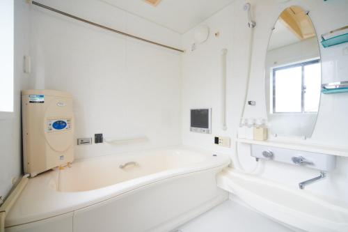 Ein Badezimmer in der Unterkunft Awaji Portside Holiday Home CHOUTA - Self Check-In Only